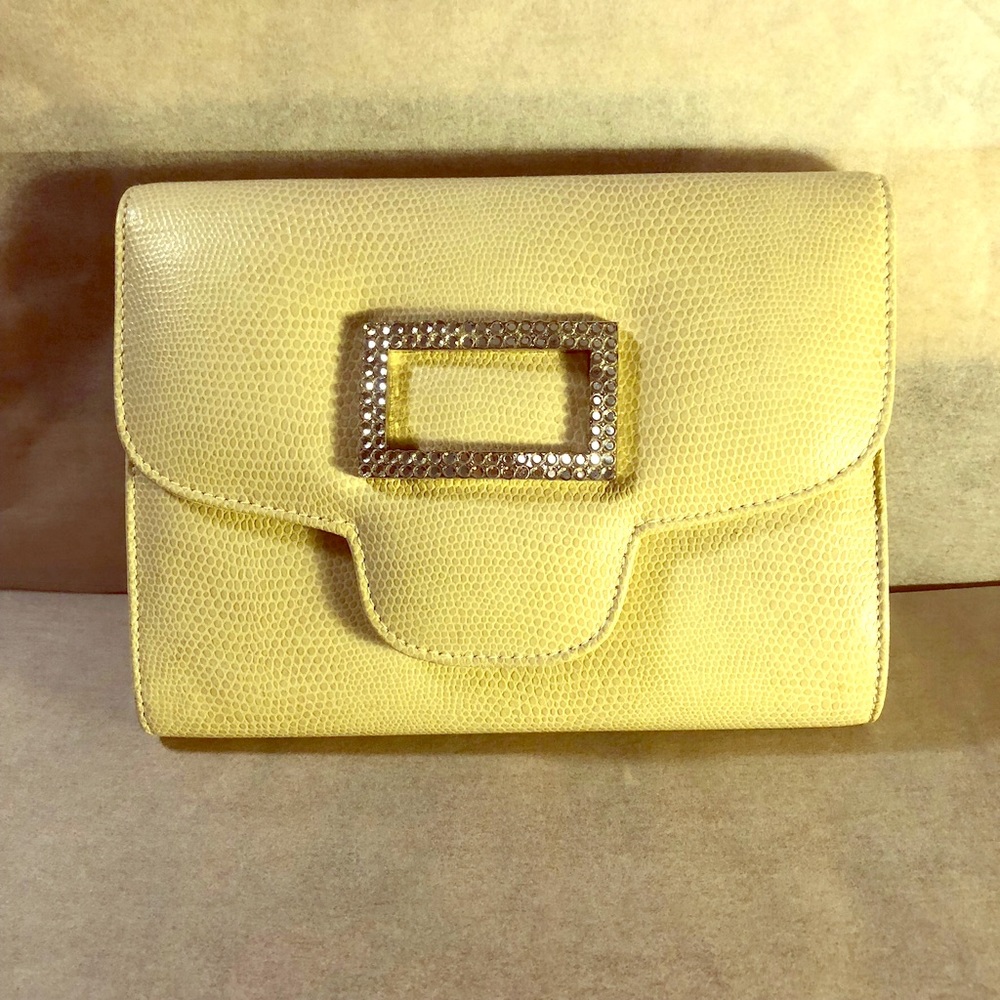 Cream clutch with rhinestone buckle